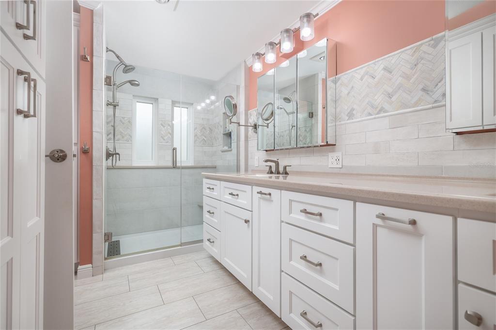 706 Starboard Avenue Edgewater, FL 32141 - Photo 17 of 35 a spacious bathroom with a shower sink and mirror