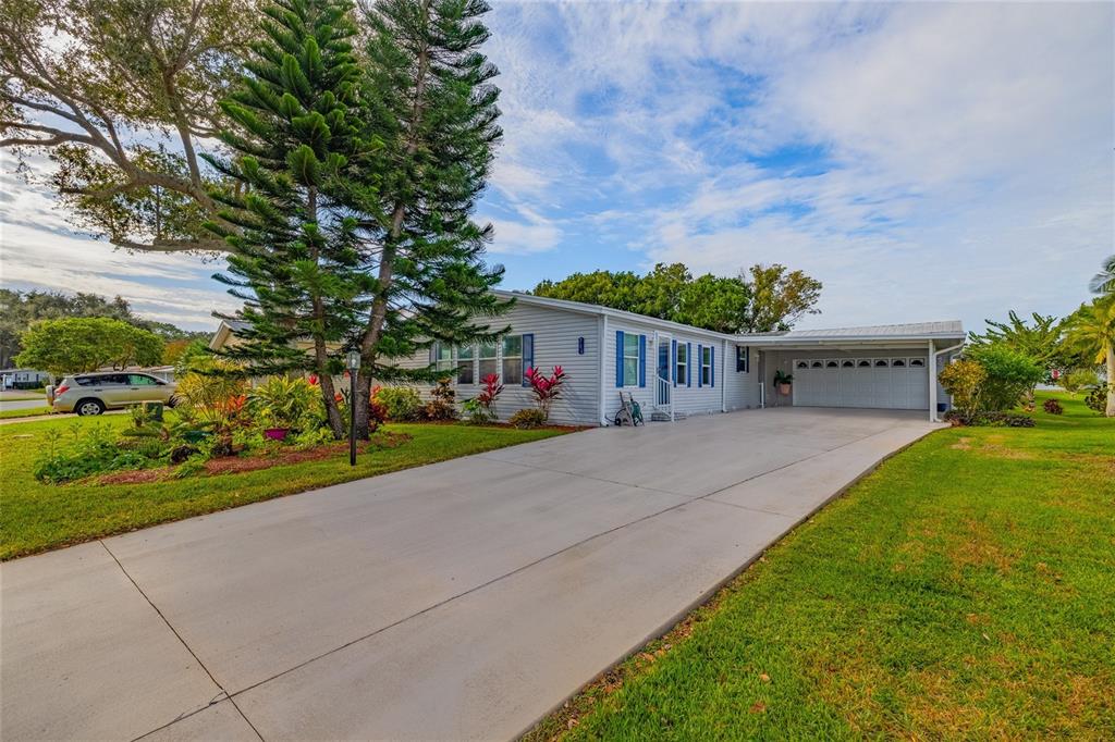 706 Starboard Avenue Edgewater, FL 32141 - Photo 2 of 35 a view of house and outdoor space