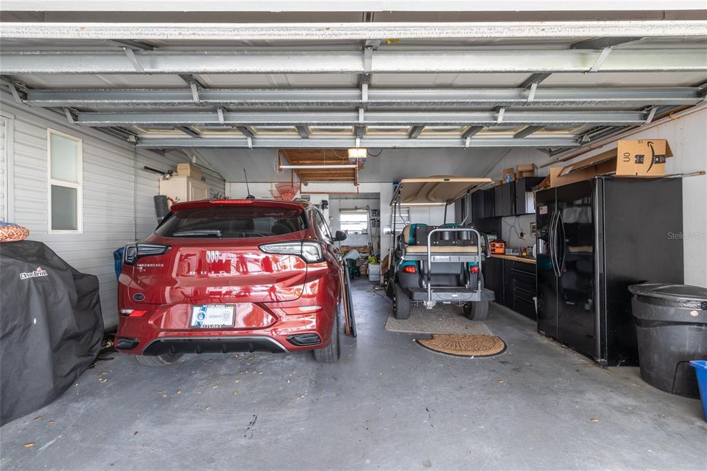 706 Starboard Avenue Edgewater, FL 32141 - Photo 24 of 35 a view of a garage with storage