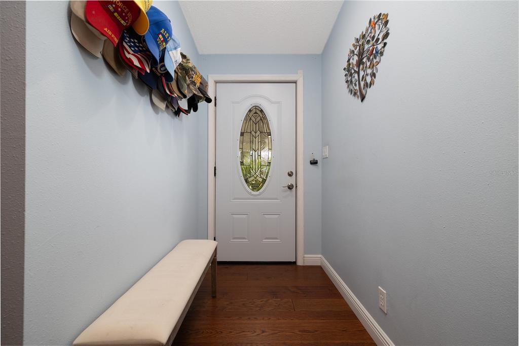 706 Starboard Avenue Edgewater, FL 32141 - Photo 4 of 35 a view of a hallway with washer and dryer