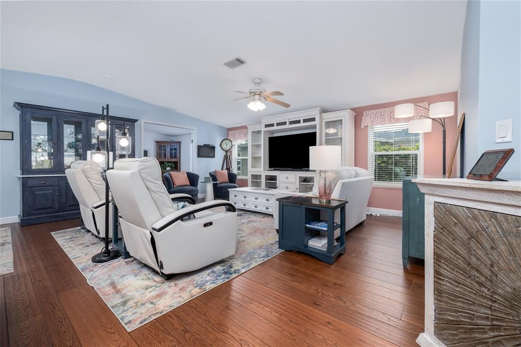 706 Starboard Avenue Edgewater, FL 32141 - Photo 5 of 35 a living room with furniture and a flat screen tv