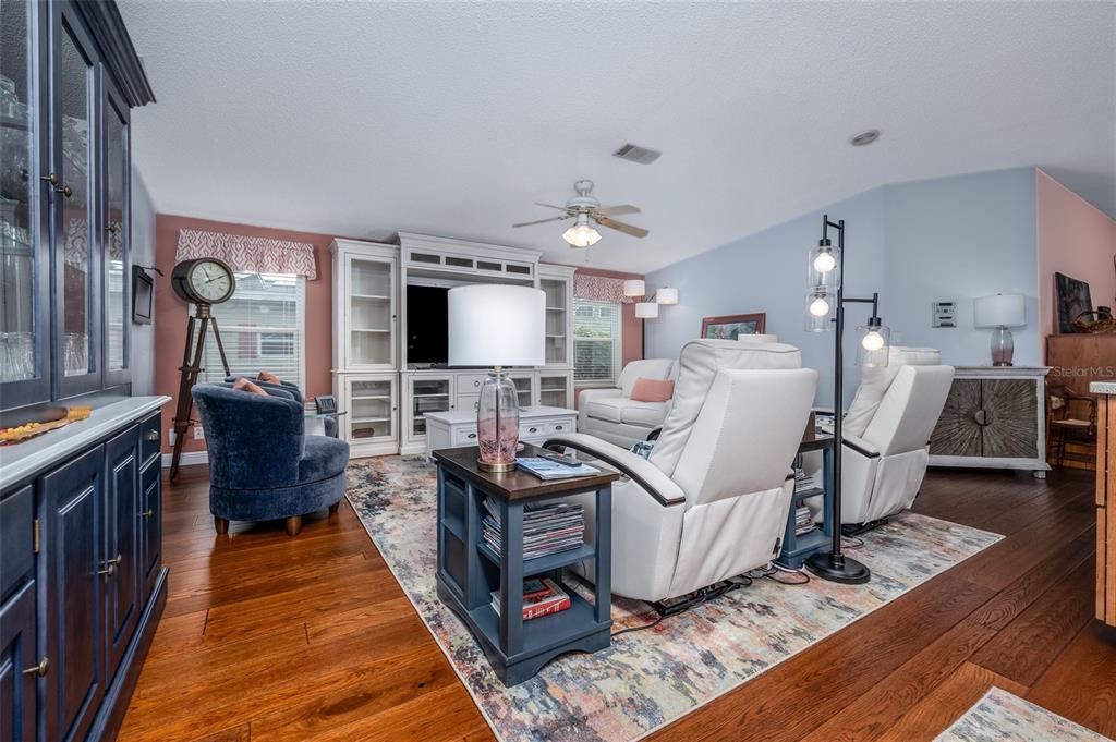 706 Starboard Avenue Edgewater, FL 32141 - Photo 7 of 35 a living room with furniture and a flat screen tv