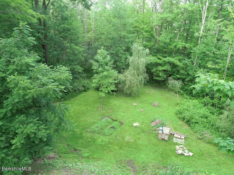 488 Summit Road Richmond, MA 01254 - Photo 11 of 44 a green field with lots of trees
