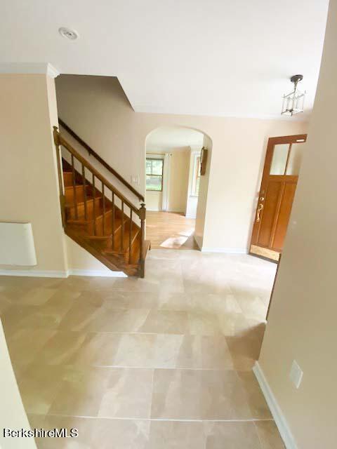 488 Summit Road Richmond, MA 01254 - Photo 21 of 44 a view of a hallway with wooden floor and stairs
