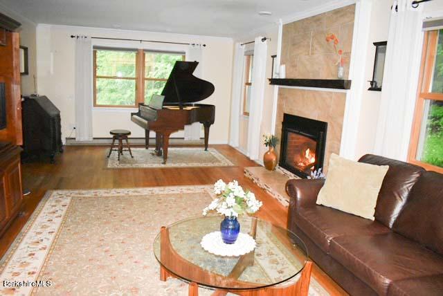 488 Summit Road Richmond, MA 01254 - Photo 22 of 44 a living room with furniture and a fireplace