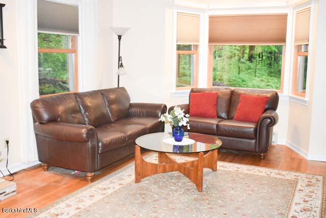 488 Summit Road Richmond, MA 01254 - Photo 24 of 44 a living room with furniture and a large window