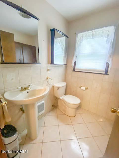488 Summit Road Richmond, MA 01254 - Photo 32 of 44 a bathroom with a sink and a mirror