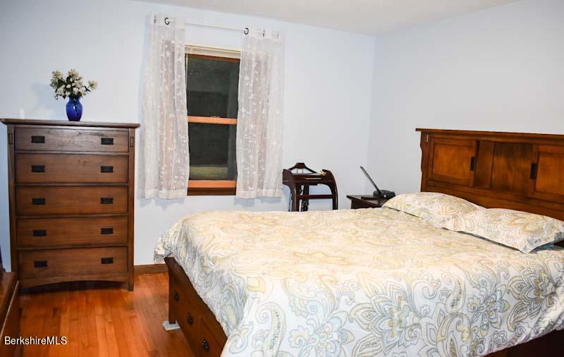 488 Summit Road Richmond, MA 01254 - Photo 38 of 44 a bedroom with a bed and a dresser