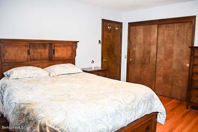 488 Summit Road Richmond, MA 01254 - Photo 39 of 44 a large white bed in a small room