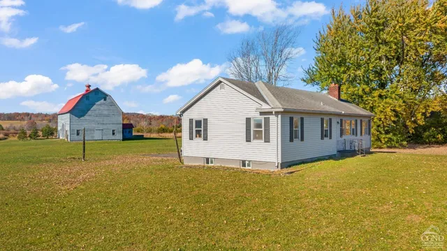 a kitchen filled counter top space and a window
