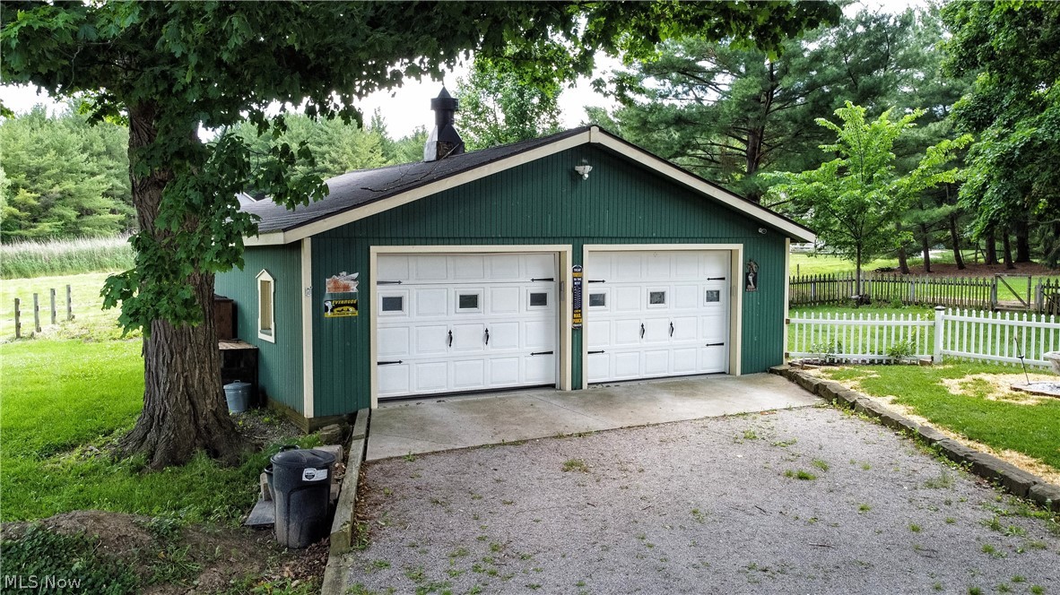 7414 Greenwich Road Seville, OH 44273 - Photo 5 of 50 Extra-wide, extra-deep detached 2-car garage providing excellent storage and workspace.