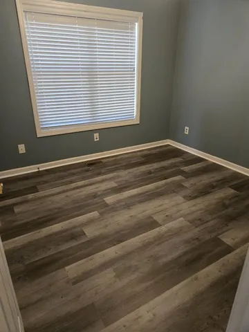 a view of a room that has a window