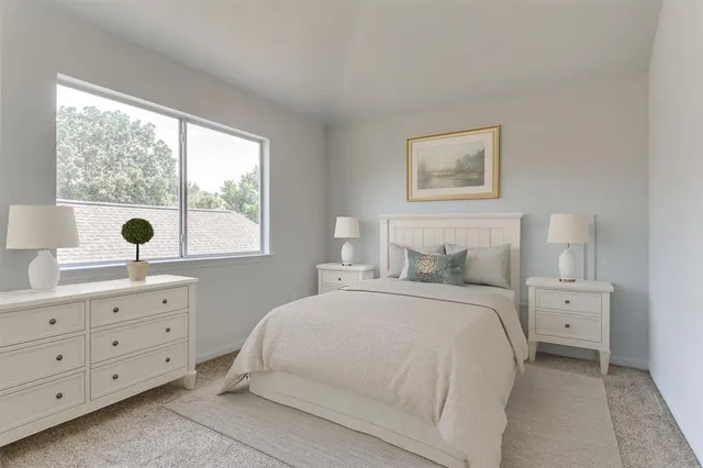 a bedroom with a bed and a closet