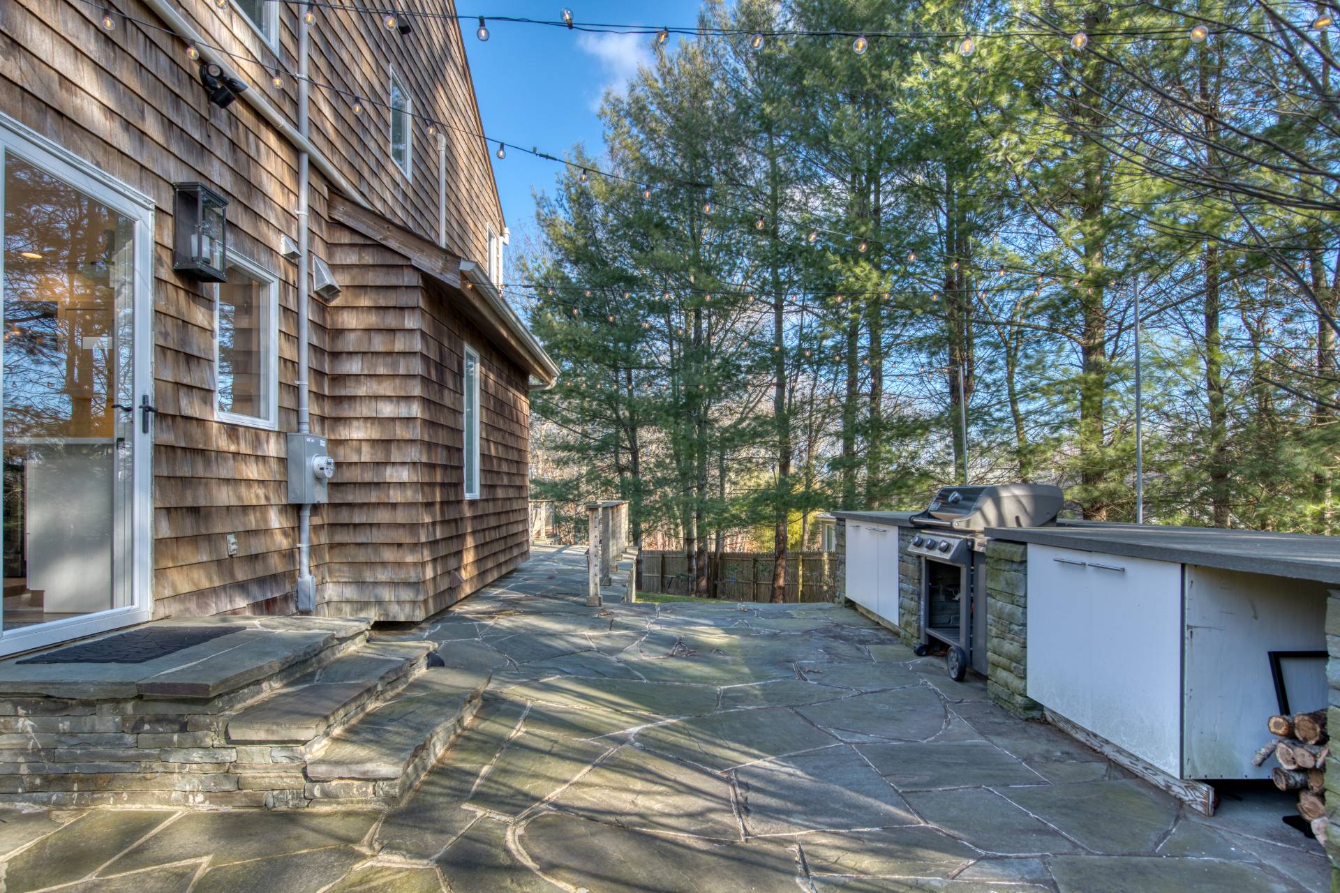10 Scallop Avenue East Hampton, NY 11937 - Photo 22 of 23 a view of a house with a yard