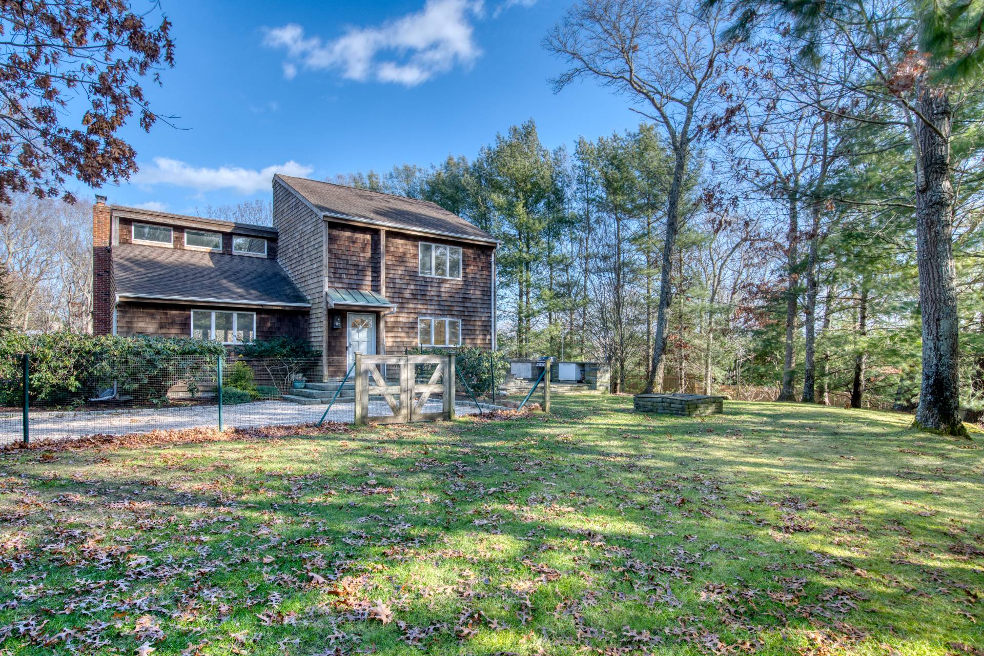 10 Scallop Avenue East Hampton, NY 11937 - Photo 23 of 23 a view of a house with a yard