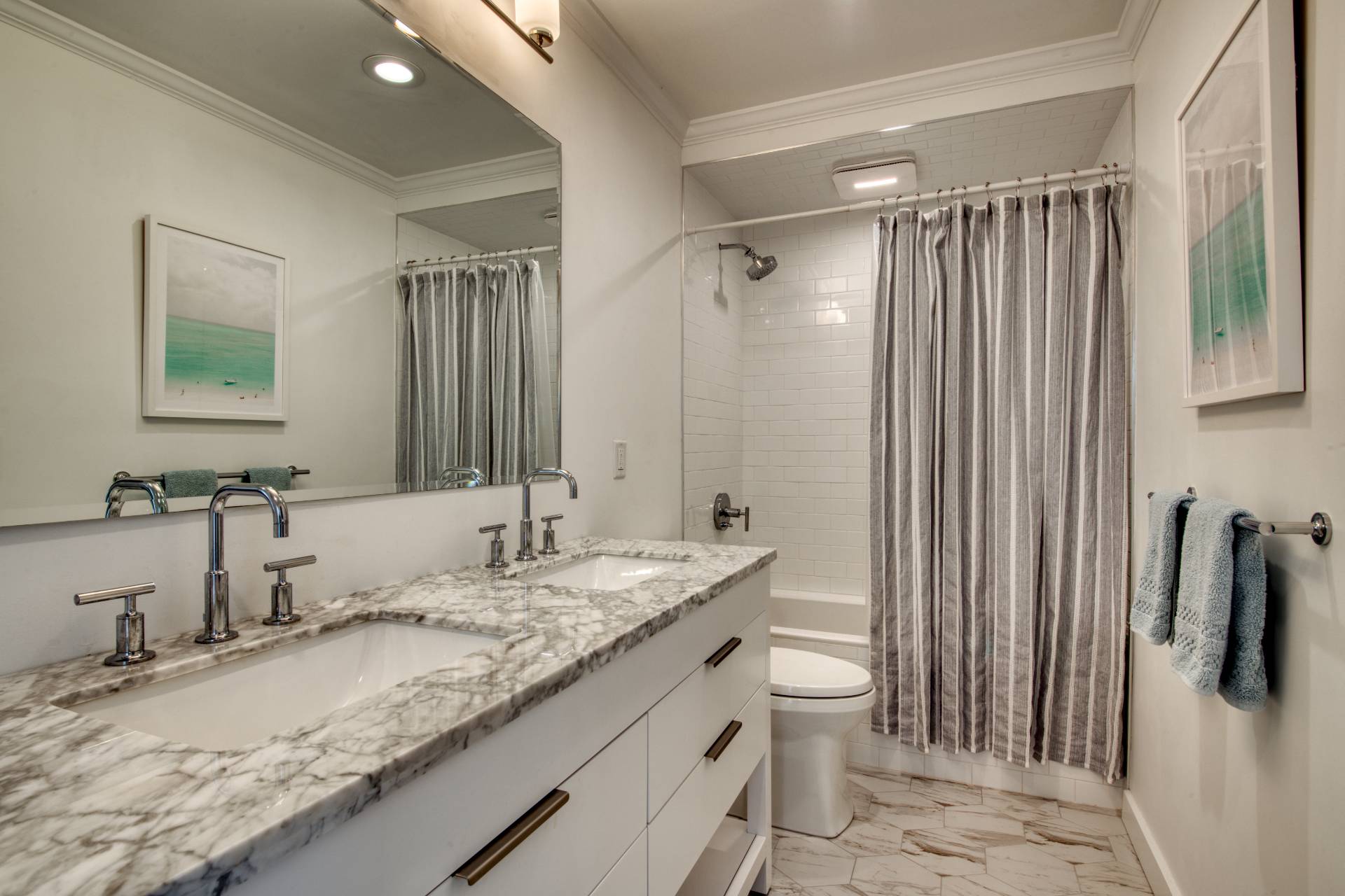 10 Scallop Avenue East Hampton, NY 11937 - Photo 8 of 23 a bathroom with a granite countertop sink and a mirror