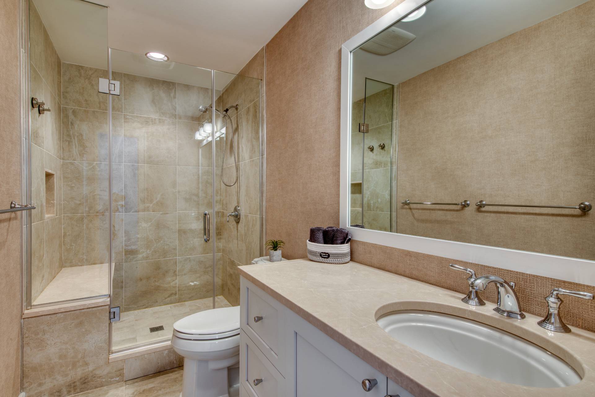 10 Scallop Avenue East Hampton, NY 11937 - Photo 9 of 23 a bathroom with a sink a toilet and shower
