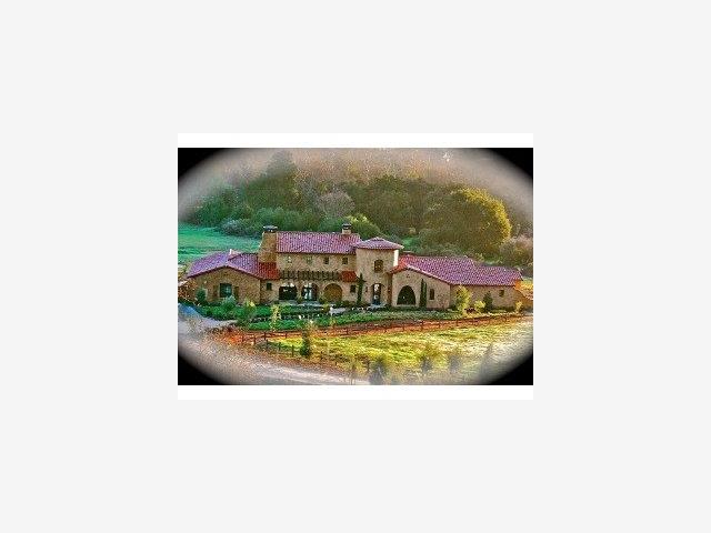 a view of a living room with a fireplace