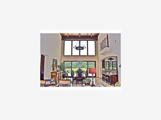 12220 Heritage Way Gilroy, CA 95020 - Photo 3 of 8 a living room with furniture and a large window