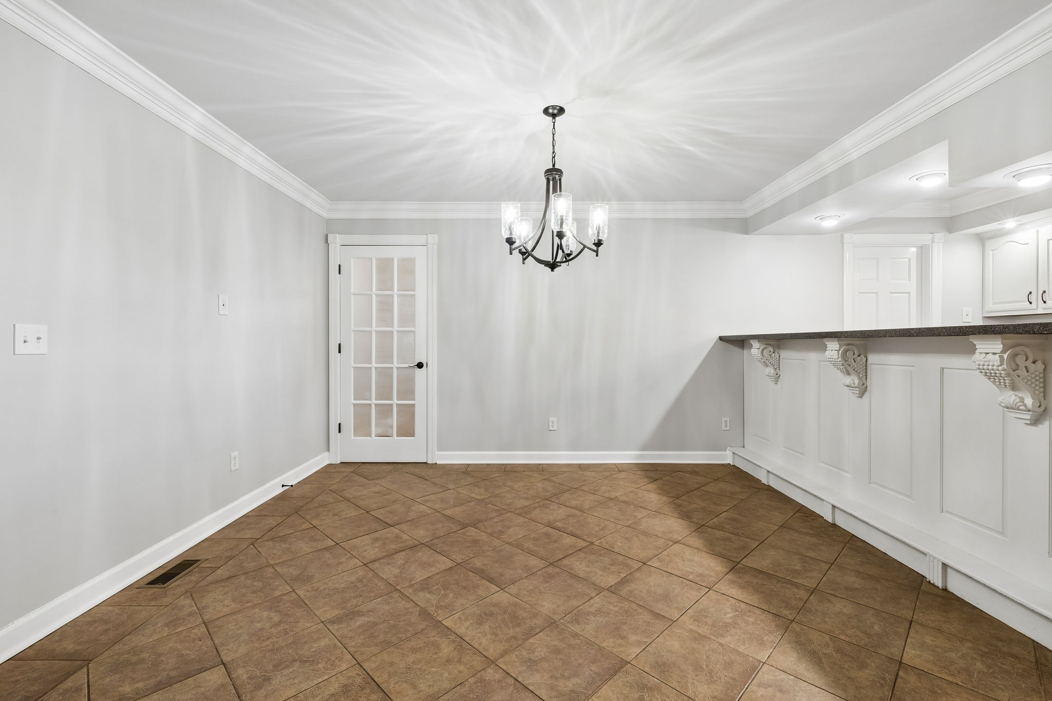100 Heath Road Charlotte, TN 37036 - Photo 11 of 42 a view of a hallway with chandelier and entryway