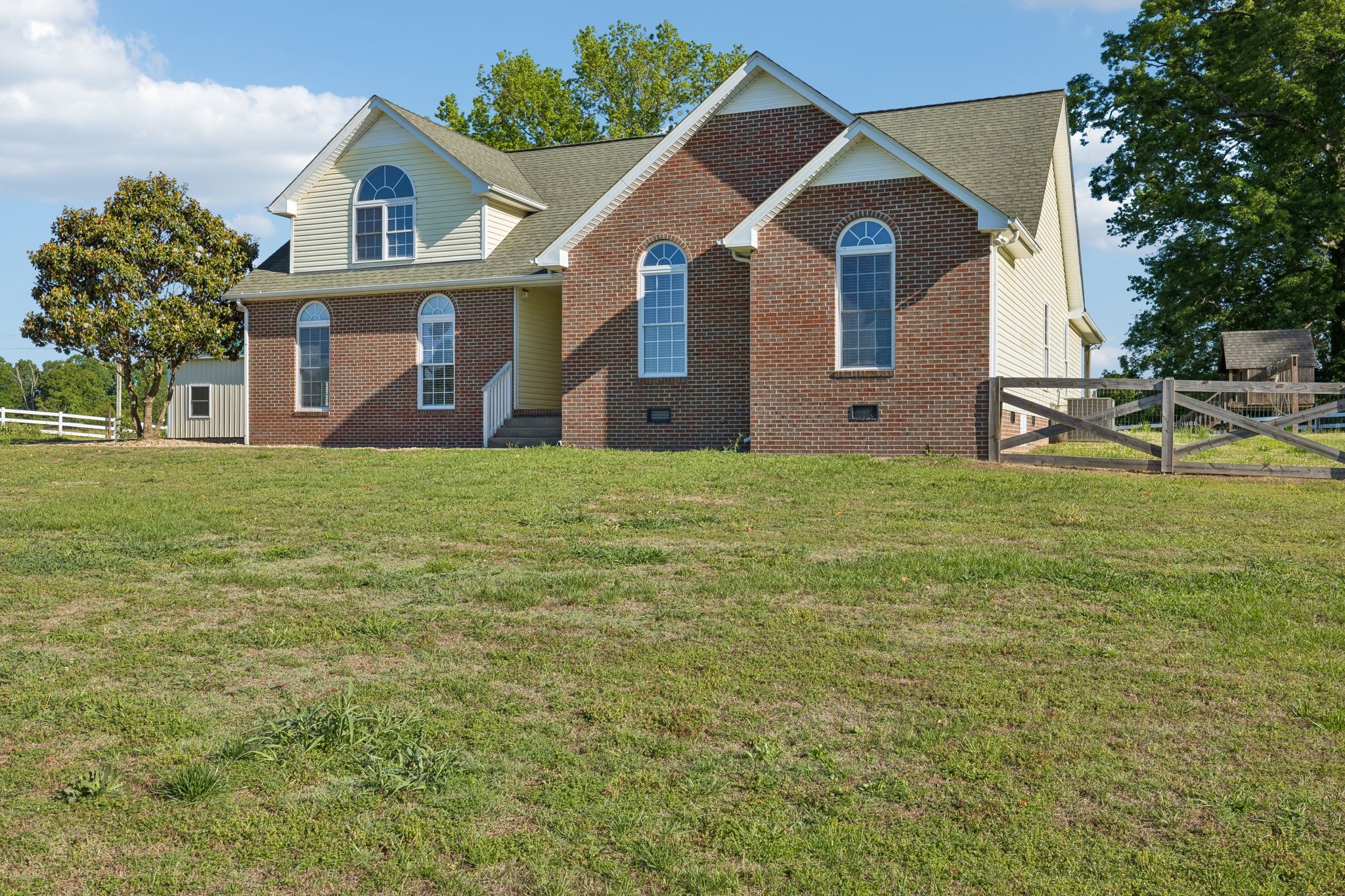 100 Heath Road Charlotte, TN 37036 - Photo 2 of 42 a view of a house with a yard