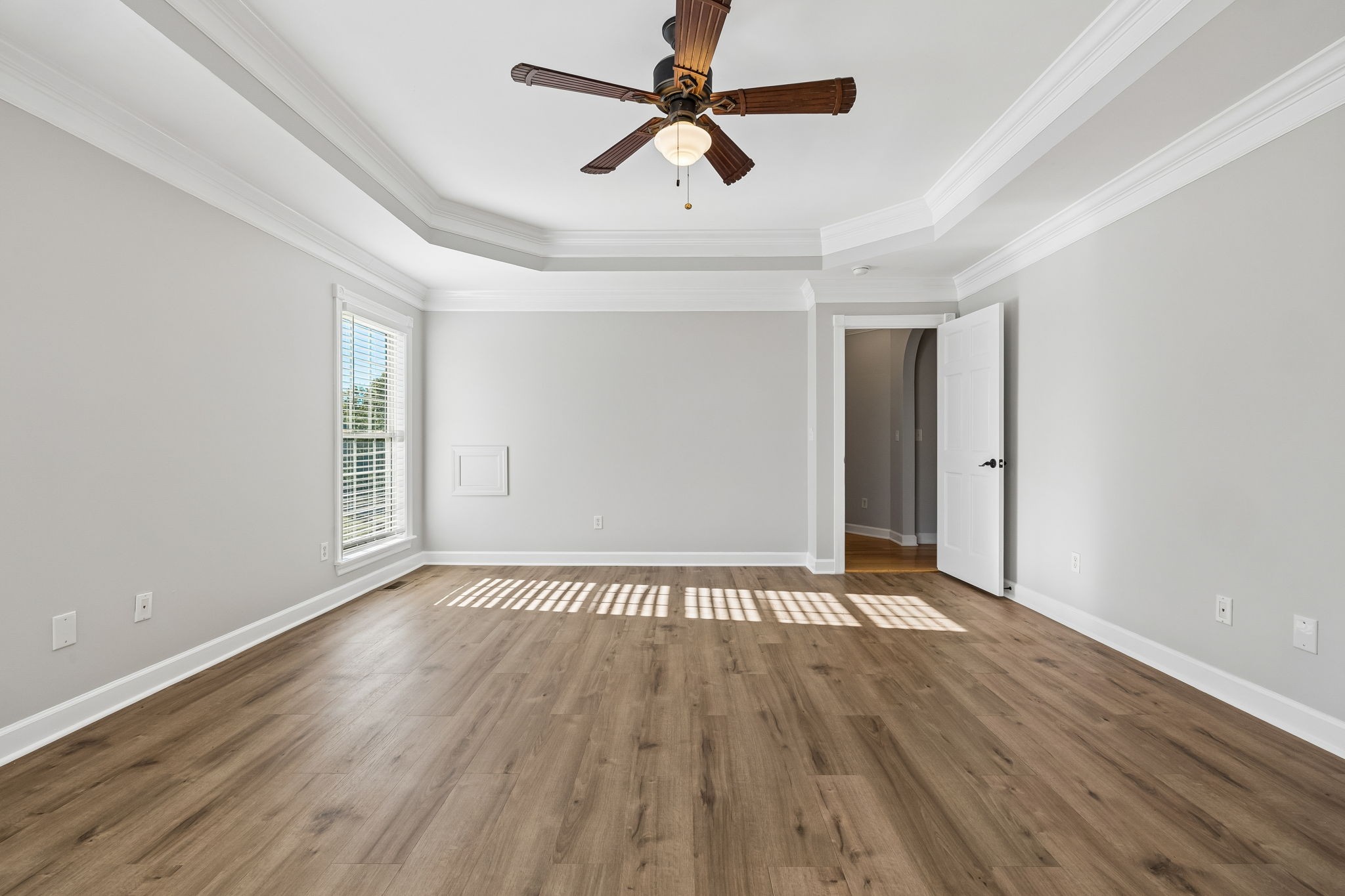 100 Heath Road Charlotte, TN 37036 - Photo 22 of 42 wooden floor in an empty room with a window