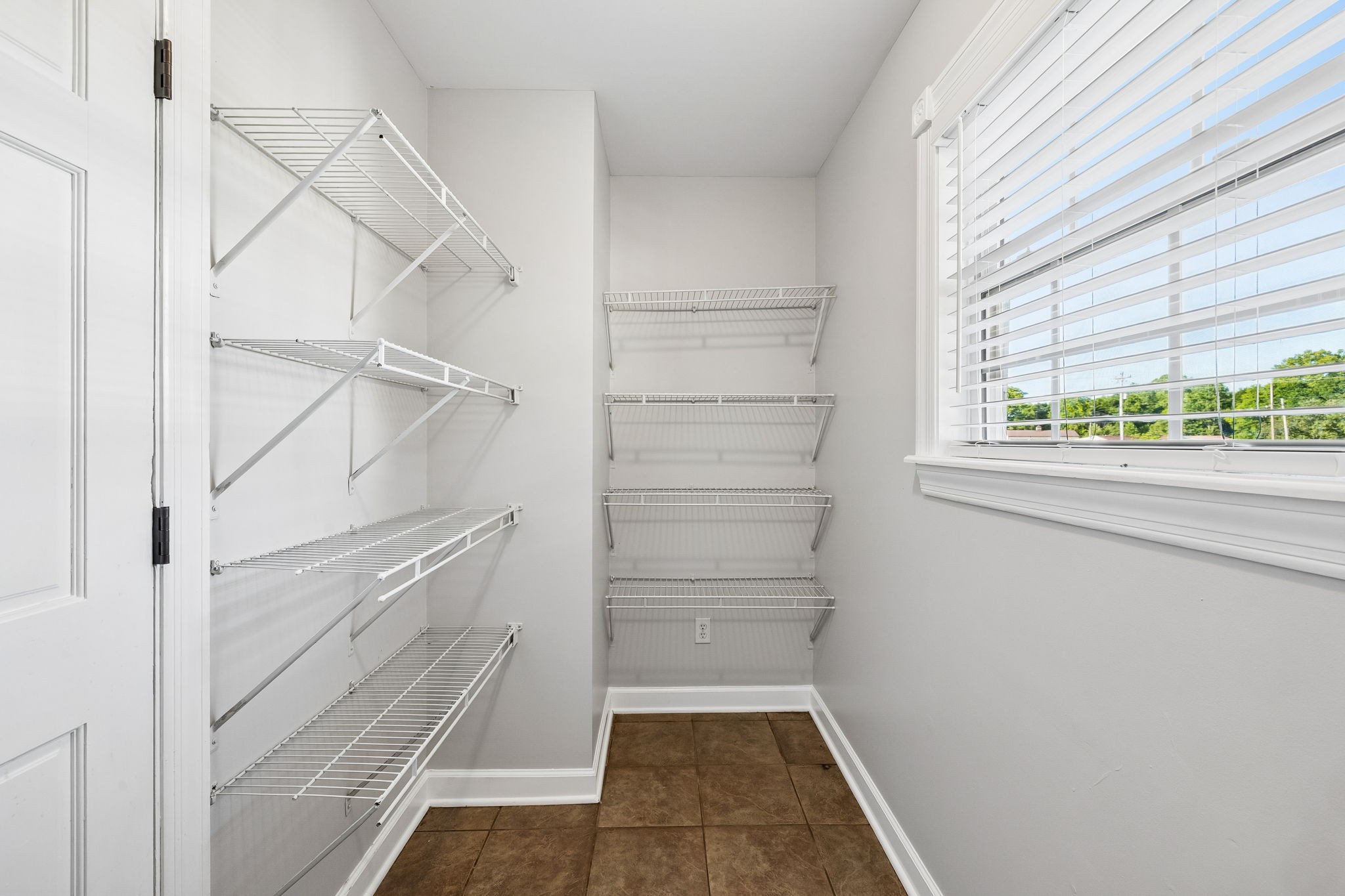 100 Heath Road Charlotte, TN 37036 - Photo 24 of 42 a view of walk in closet with window