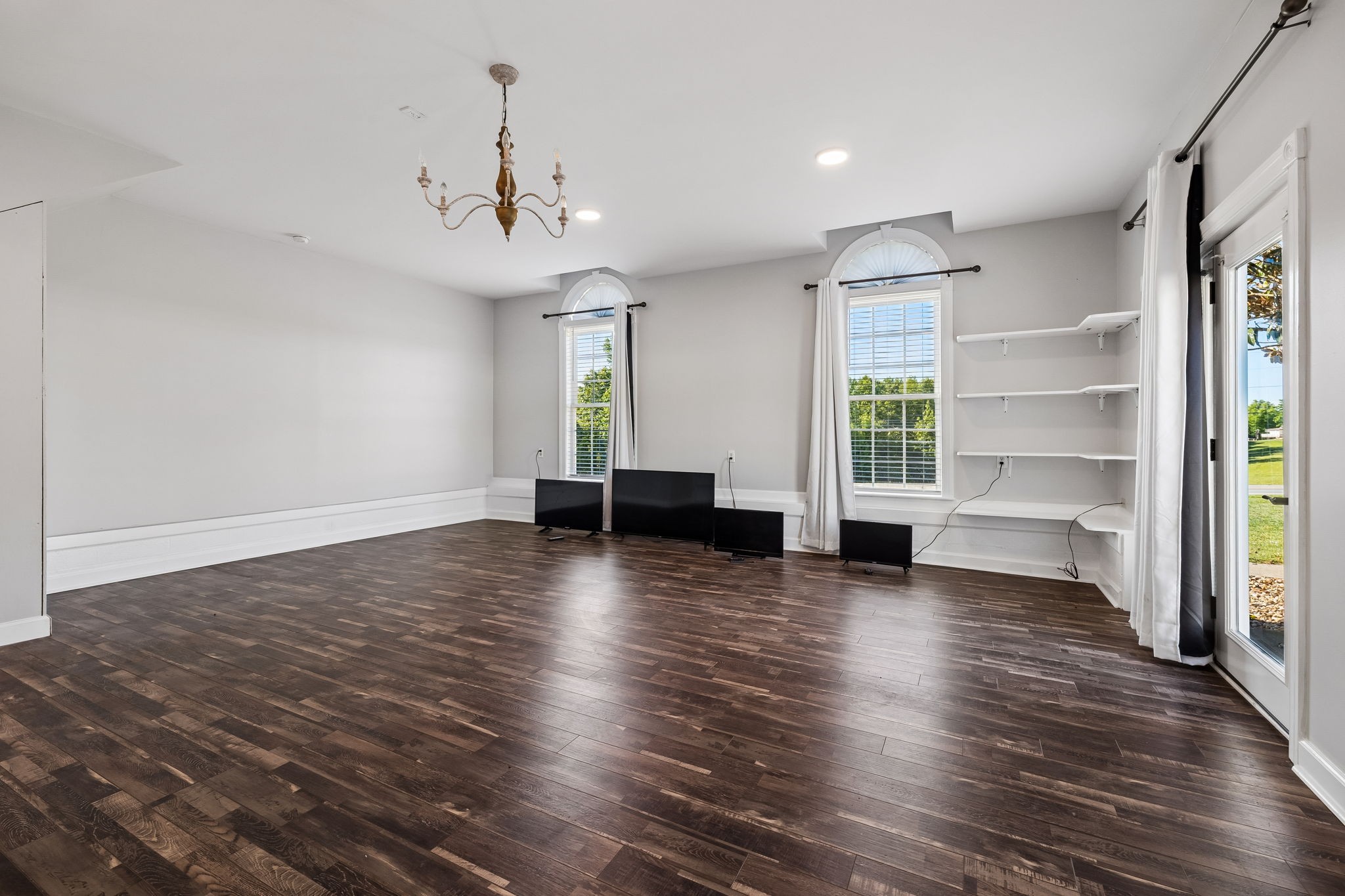 100 Heath Road Charlotte, TN 37036 - Photo 36 of 42 wooden floor in an empty room with a window