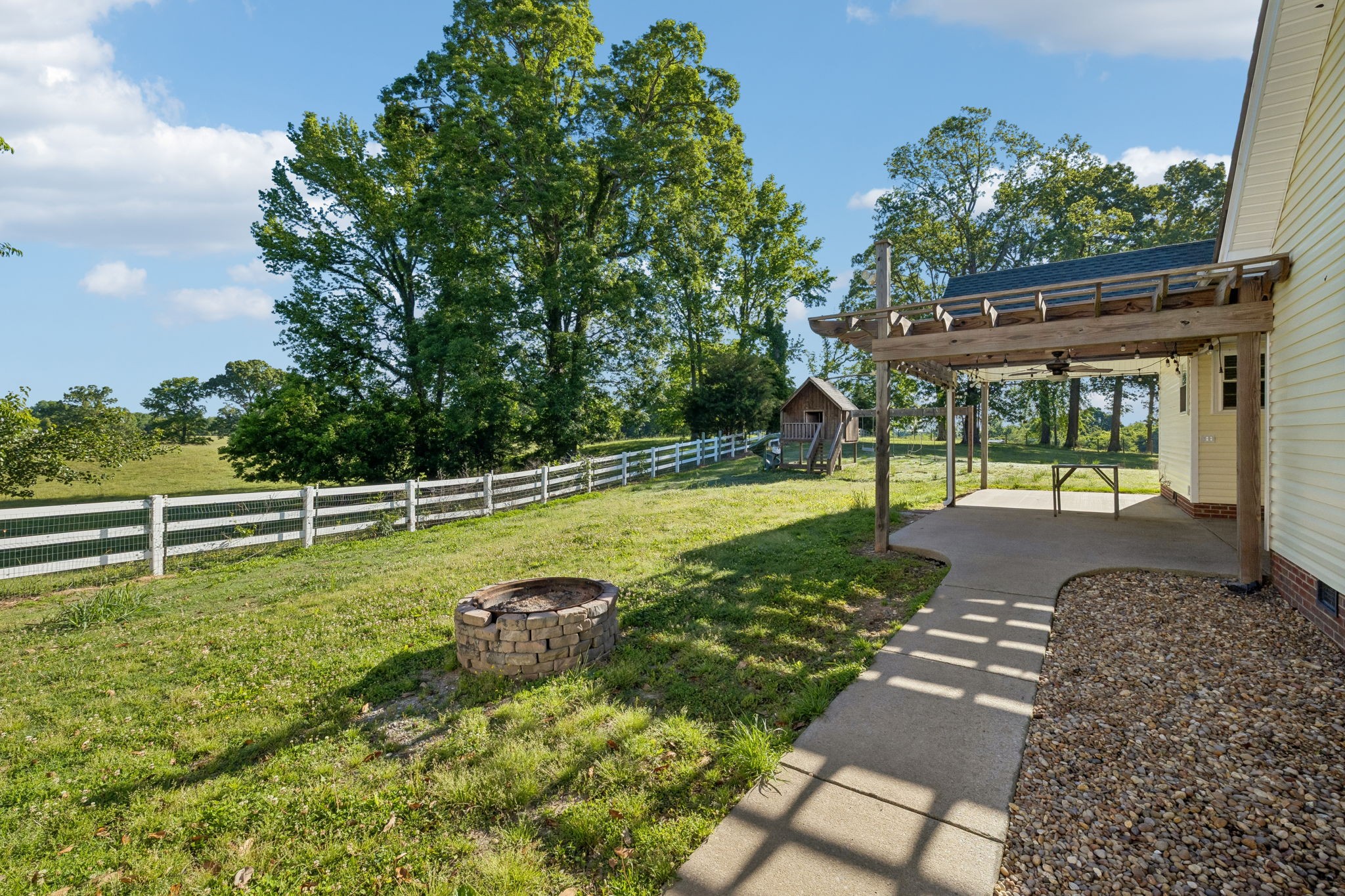 100 Heath Road Charlotte, TN 37036 - Photo 39 of 42 a view of a backyard with swimming pool