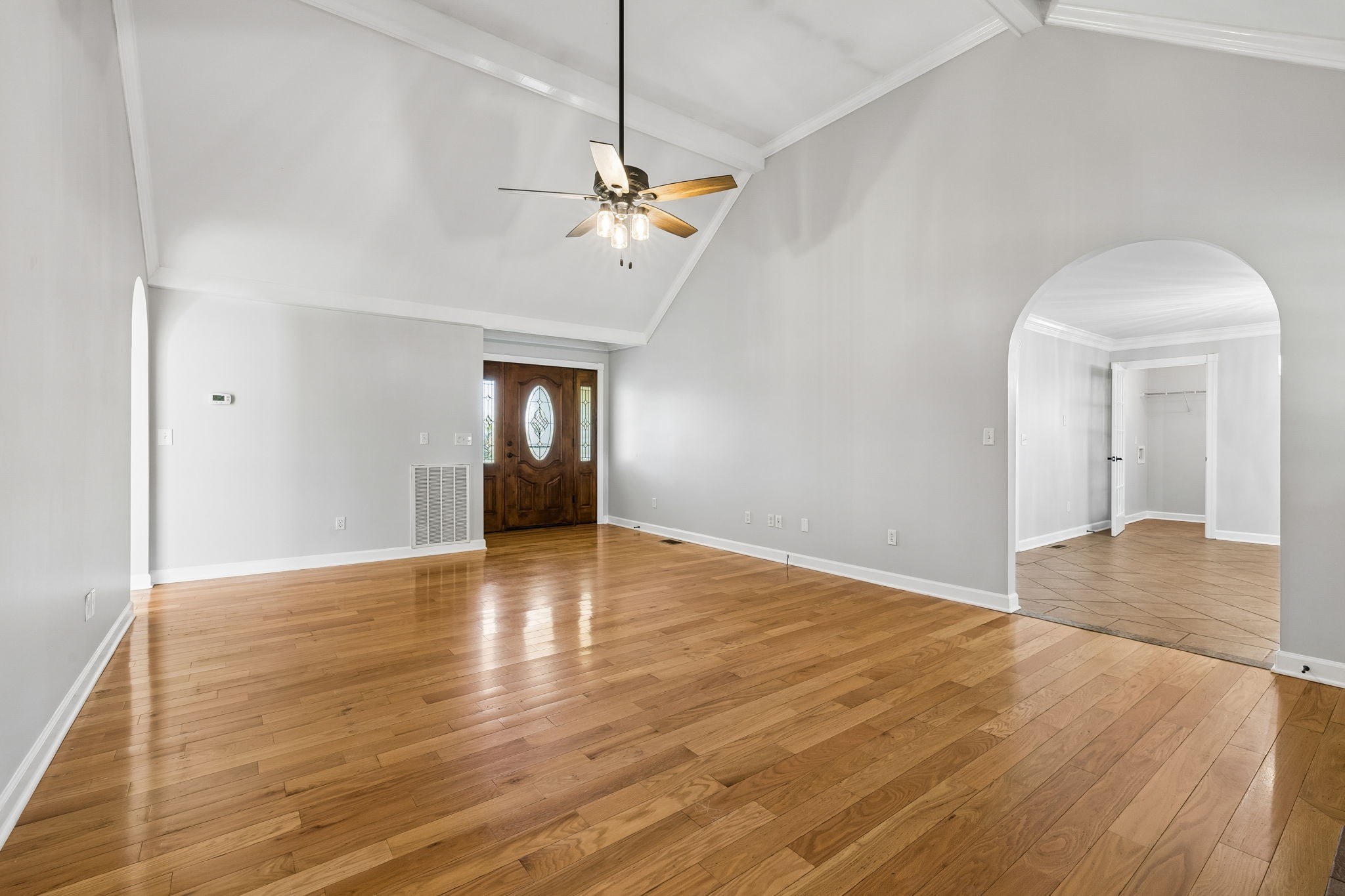 100 Heath Road Charlotte, TN 37036 - Photo 9 of 42 a view of empty room with wooden floor and ceiling fan