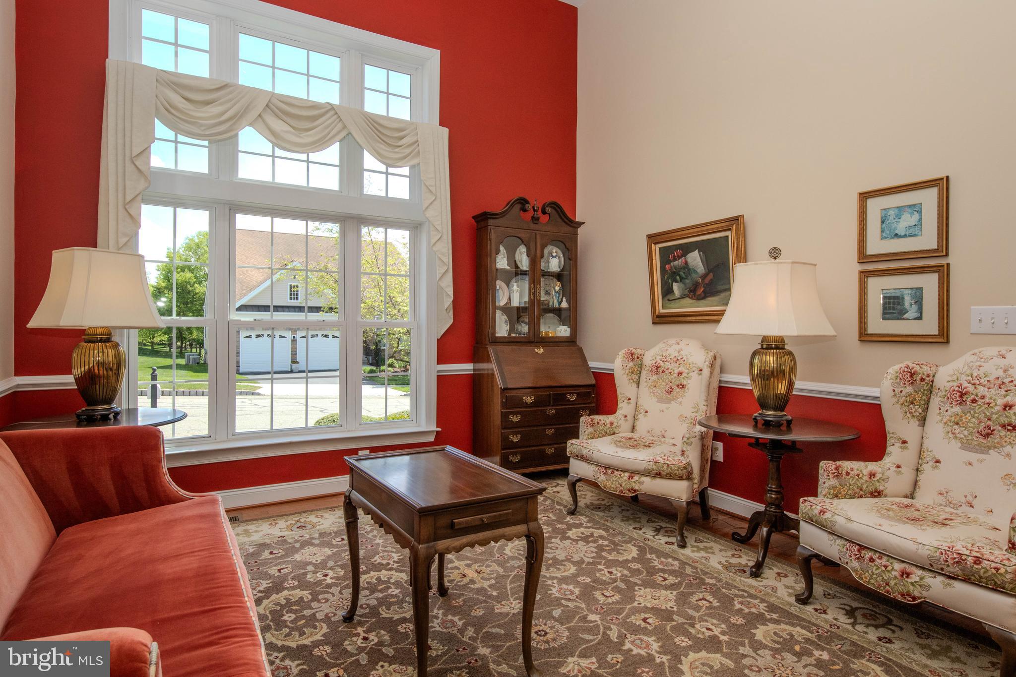 Formal Living w/ Beautiful windows + transoms