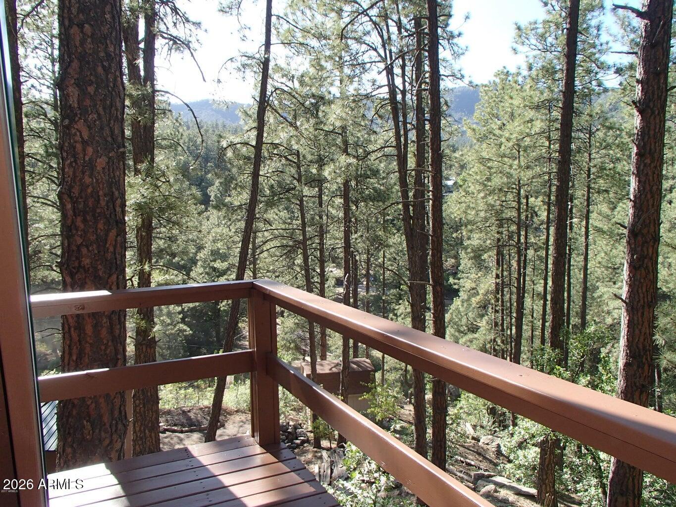 7345 Crown King Road Crown King, AZ 86343 - Photo 2 of 22 a view of trees and trees from a balcony