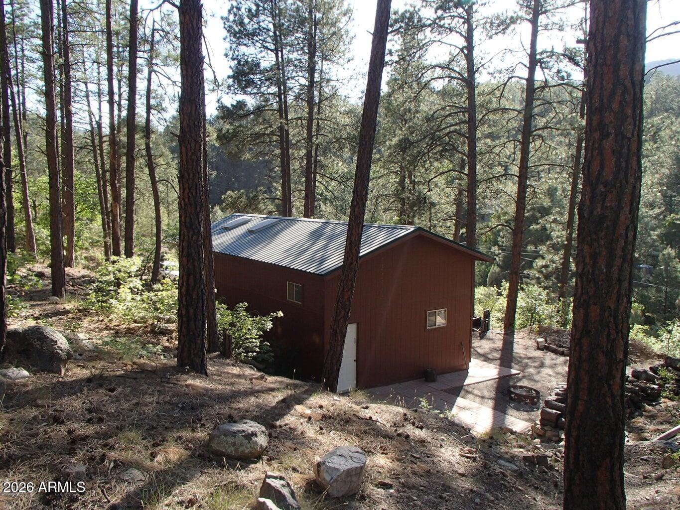 7345 Crown King Road Crown King, AZ 86343 - Photo 3 of 22 a view of a house with a yard