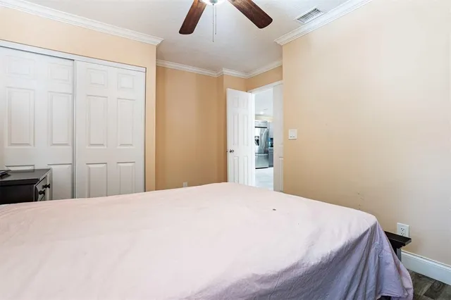 a large white bed in a white room