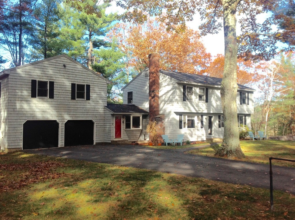 99 Keyes Road Westford, MA 01886 - Photo 1 of 20 a front view of a house with a yard