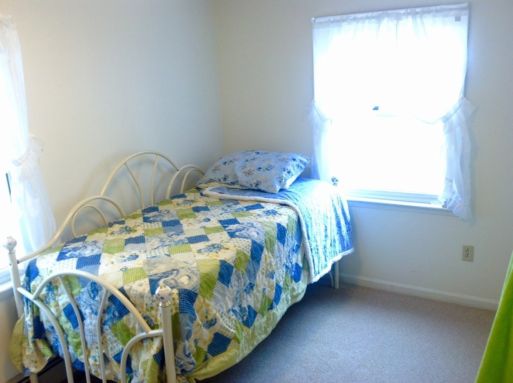 99 Keyes Road Westford, MA 01886 - Photo 15 of 20 a bedroom with a bed and a window