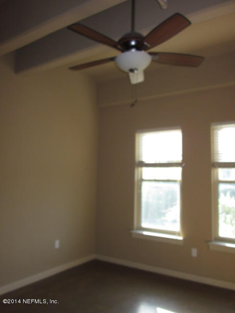 1661 Riverside Avenue, Unit 307 Jacksonville, FL 32204 - Photo 15 of 24 an empty room with a window