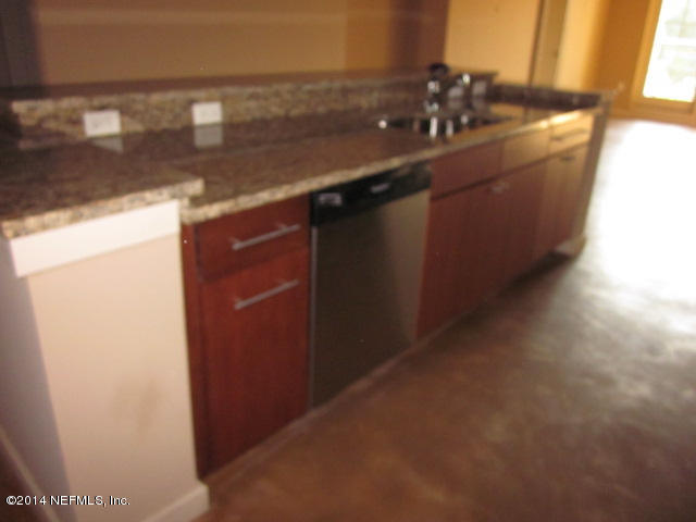 1661 Riverside Avenue, Unit 307 Jacksonville, FL 32204 - Photo 8 of 24 a kitchen with a sink