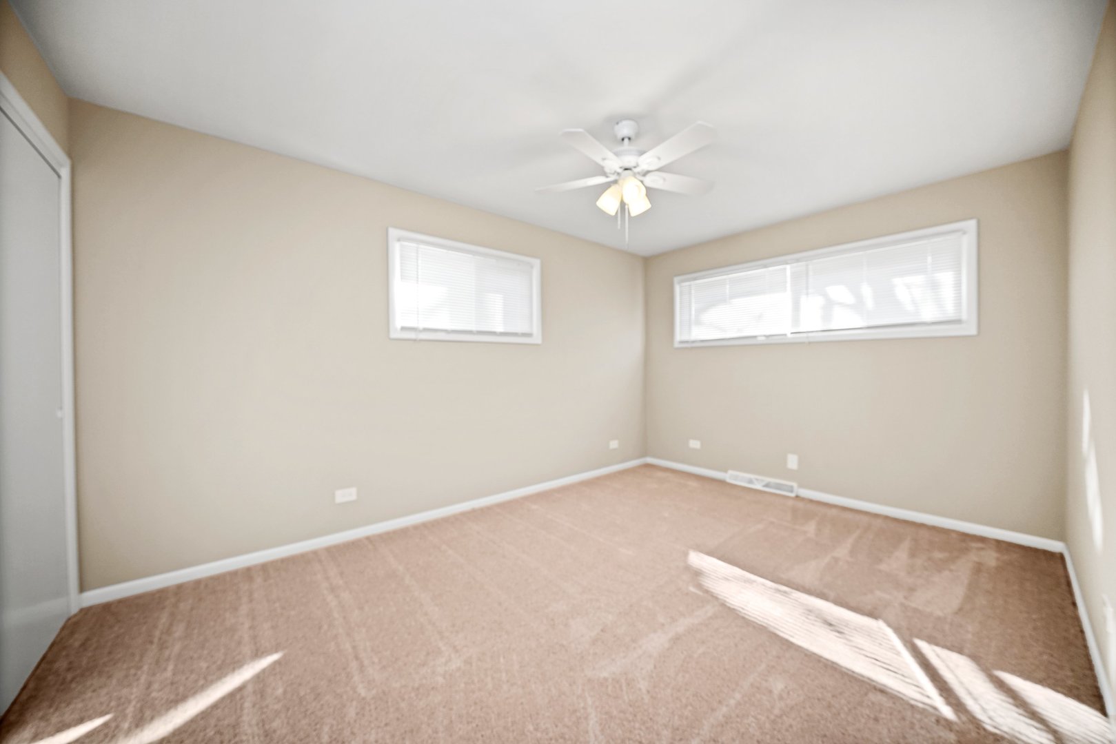 609 Delles Road Wheaton, IL 60187 - Photo 13 of 28 a view of an empty room with a window