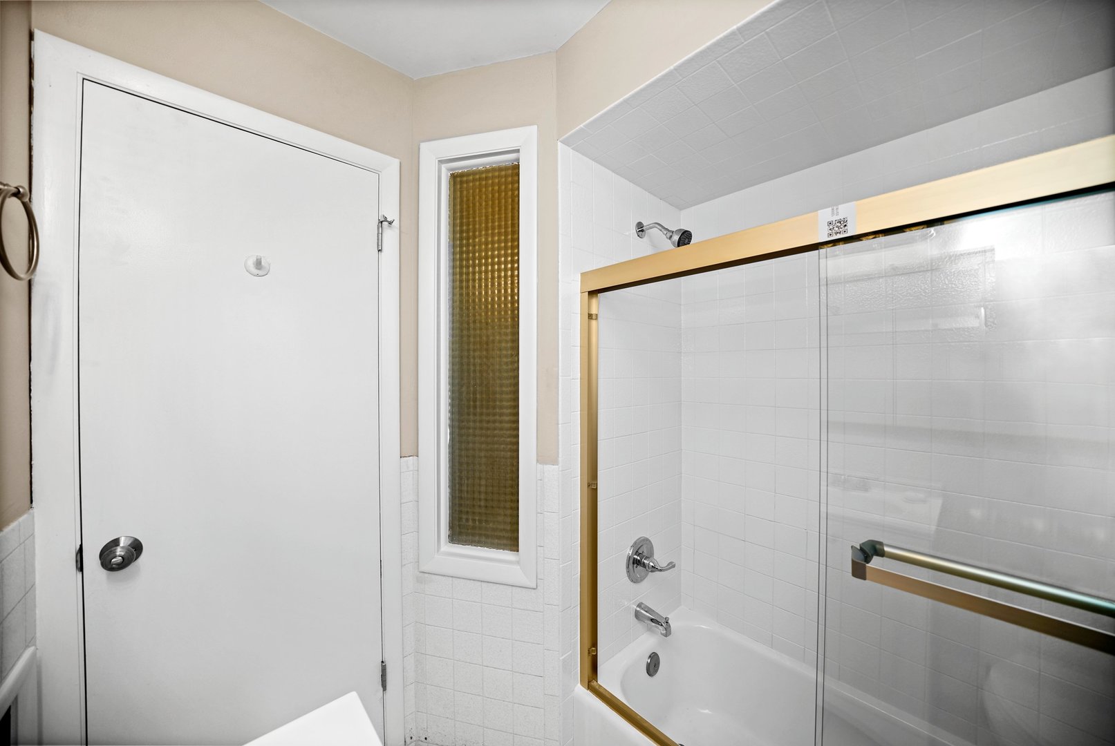 609 Delles Road Wheaton, IL 60187 - Photo 16 of 28 a bathroom with a shower and a glass door