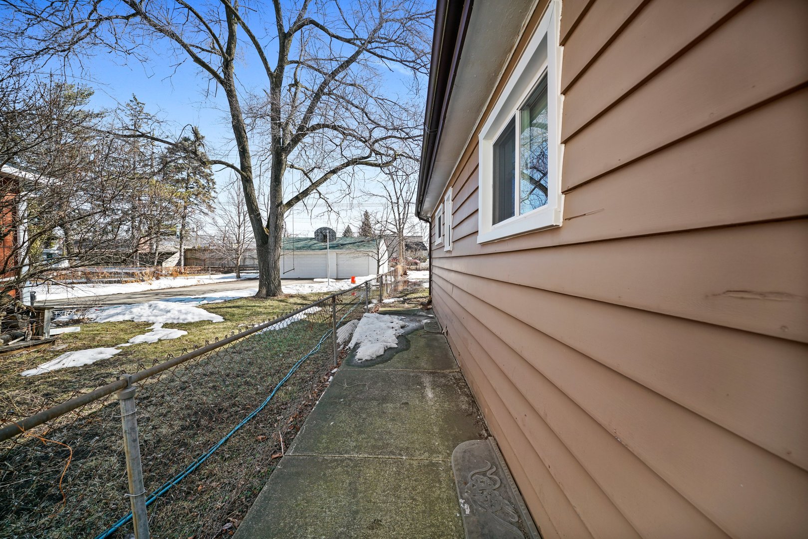 609 Delles Road Wheaton, IL 60187 - Photo 22 of 28 a view of a pathway with a yard