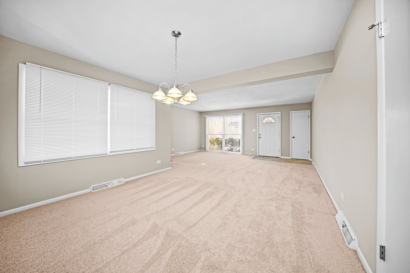 609 Delles Road Wheaton, IL 60187 - Photo 6 of 28 a view of an empty room with a window