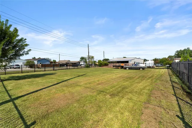 a living room with furniture and flat screen tv