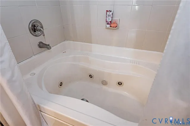 a bathroom with a bathtub