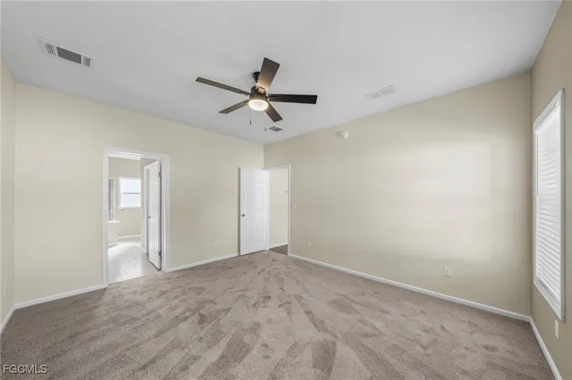 a view of a big room with wooden floor in a room