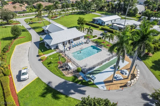 an aerial view of a house with outdoor space
