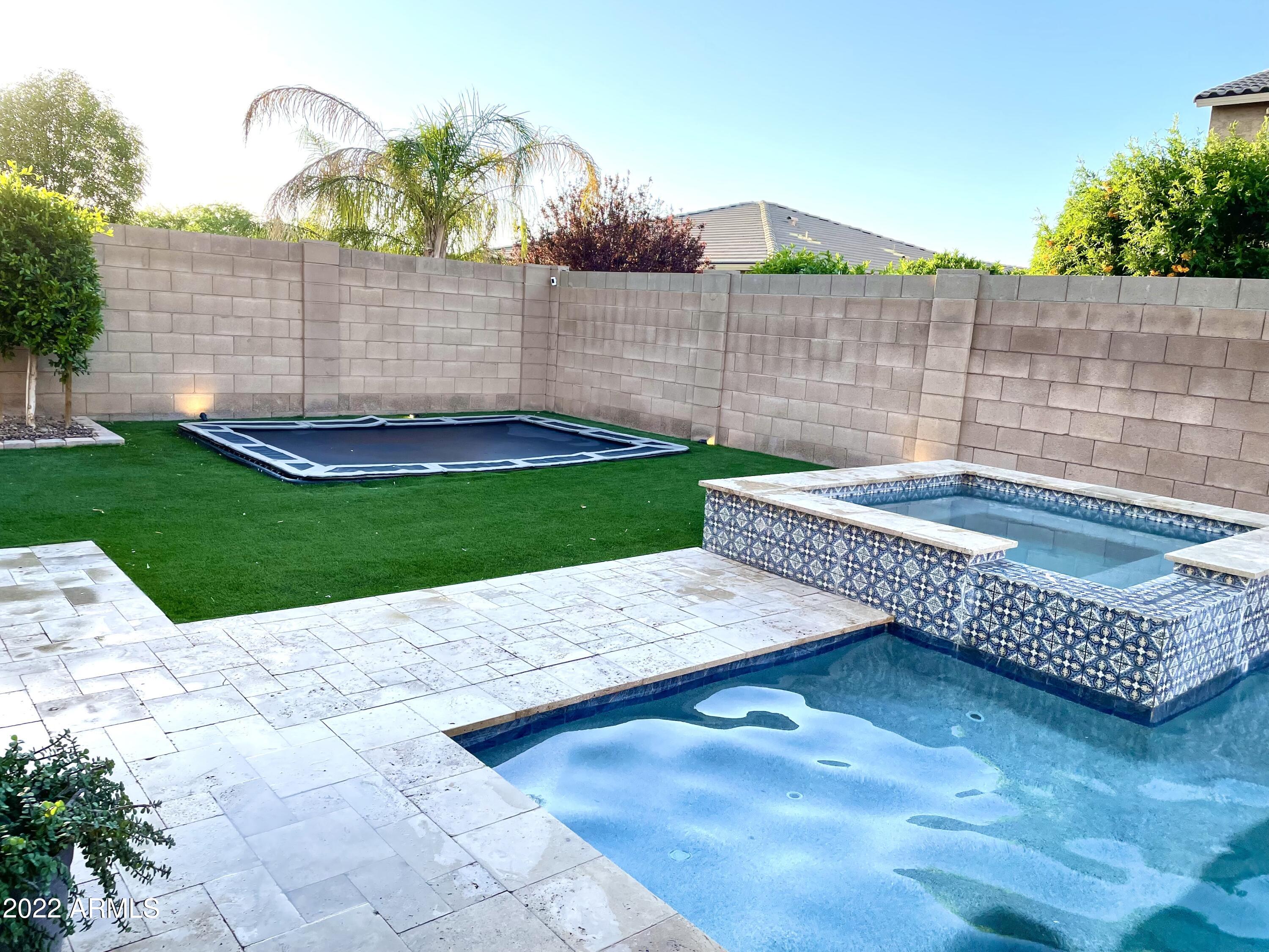 20060 Rosa Road Queen Creek, AZ 85142 - Photo 41 of 46 Yard and trampoline