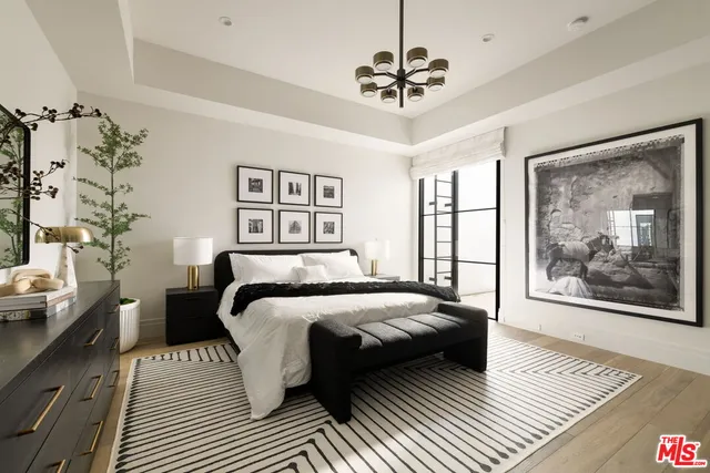 a bathroom with a mirror and a sink