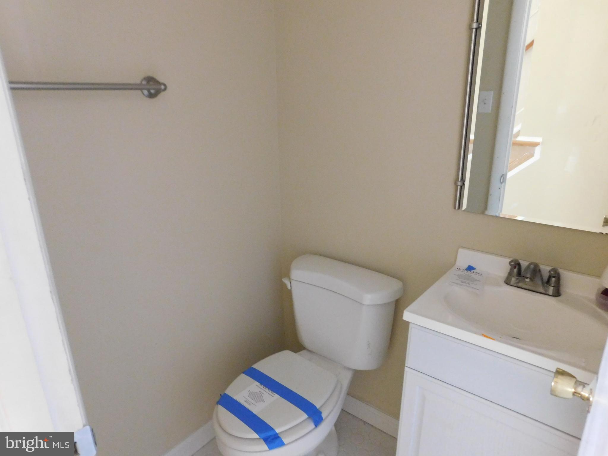 8302 Sagramore Road Baltimore, MD 21237 - Photo 11 of 22 Main Level Half Bathroom