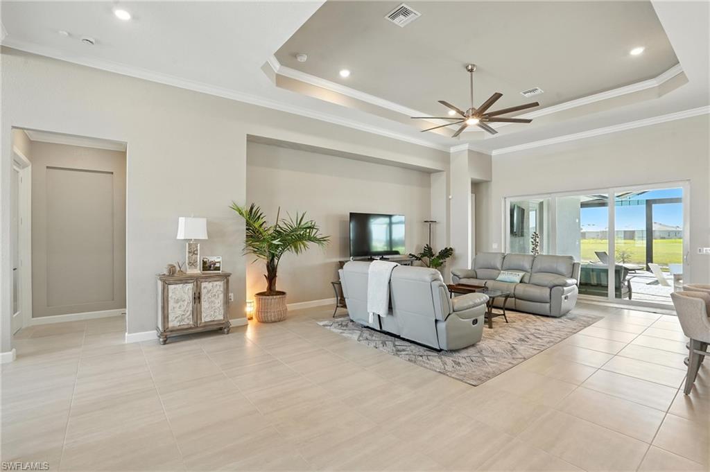 15027 Longs Lane Babcock Ranch, FL 33982 - Photo 12 of 50 a living room with furniture and a large window